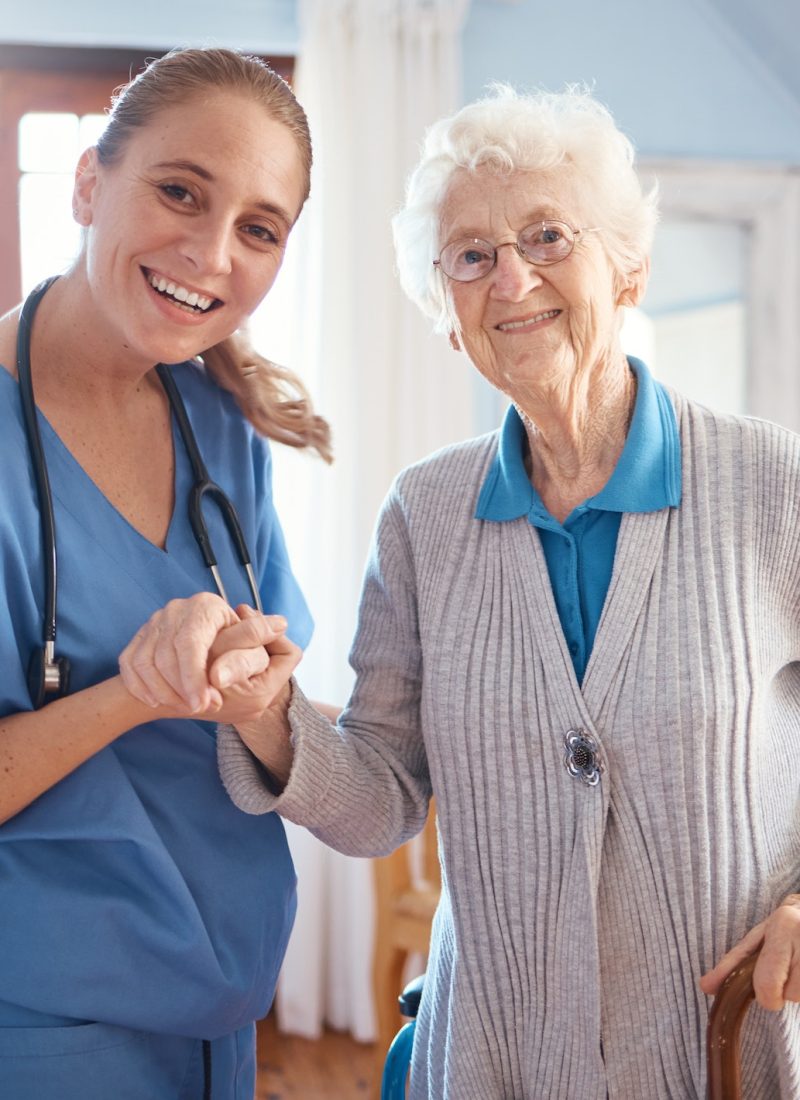 holding-hands-portrait-and-nurse-with-a-senior-woman-after-medical-consultation-in-a-nursing-facil.jpg